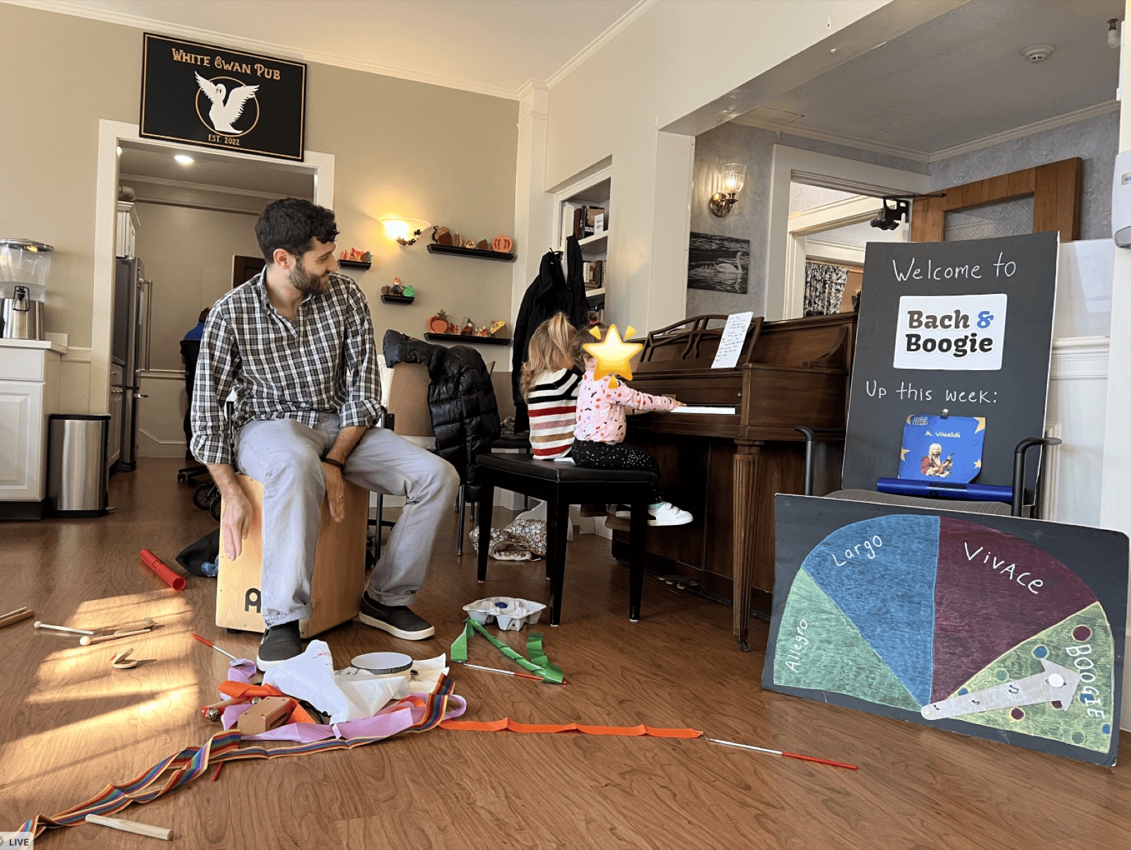 Toddler exploring instruments during class
